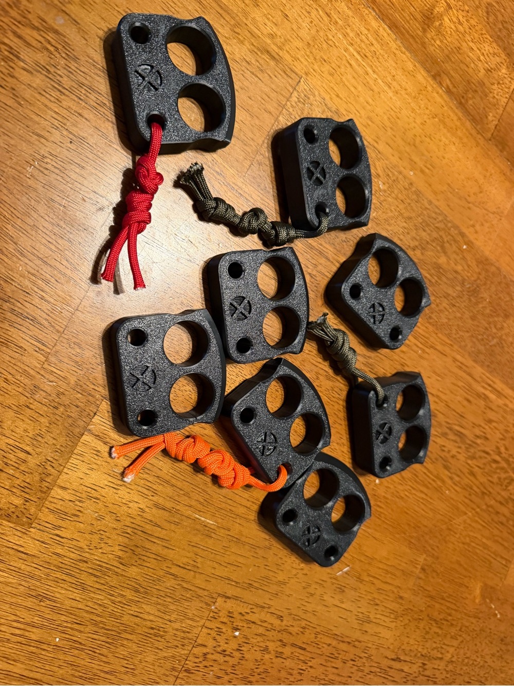 (1) Double Finger Knuckle with red paracord.